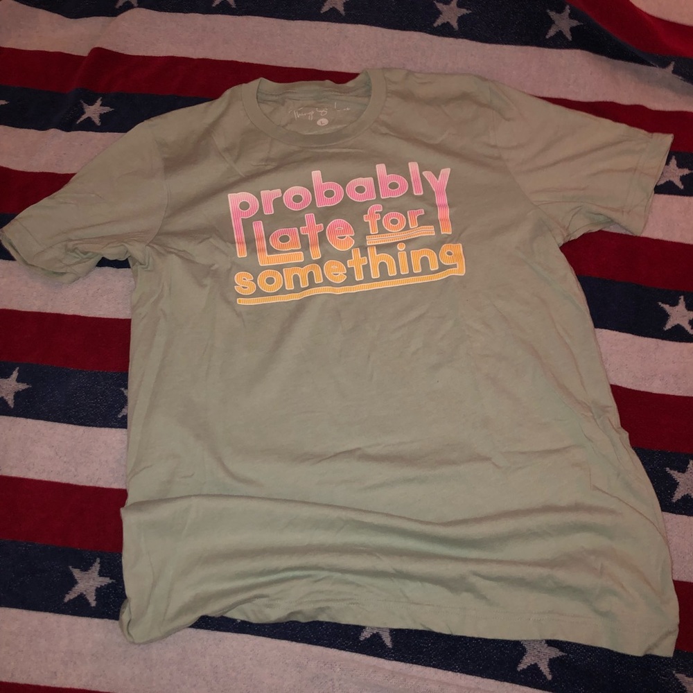 Probably late for something, shirt